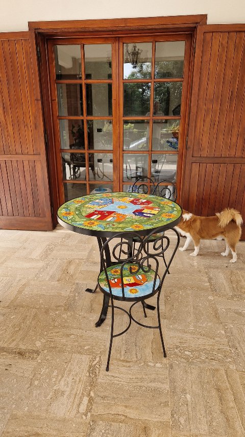 Tavolo tondo d.cm.90 - Casette con Girasoli Nino Parrucca in ferro e ceramica