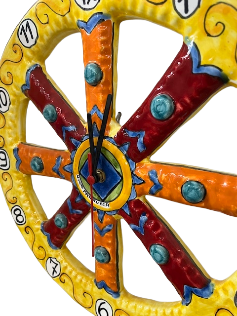 Orologio a ruota di carretto siciliano D.cm.35 Nino Parrucca in ceramica