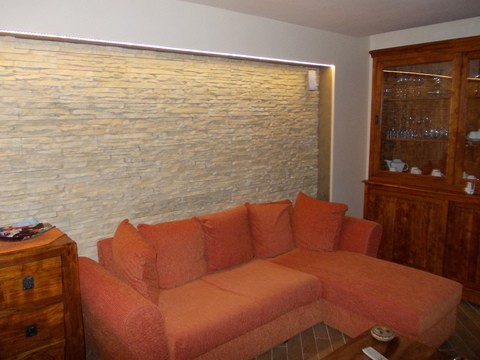 Primiceri scaglia realizzazione parete salone