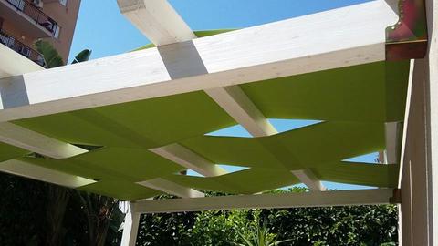 Pergola addossata con teli