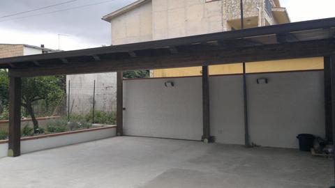 Copertura posteggio di tre auto