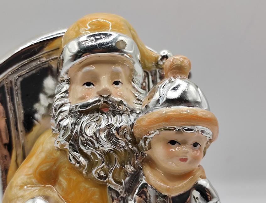 Babbo Natale H 10 in Argento Laccato Oro in poltrona Sconti per Fioristi, Wedding e Aziende
