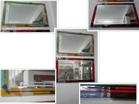 Specchiere aventi una cornice realizzata con la tecnica della vetro fusione.