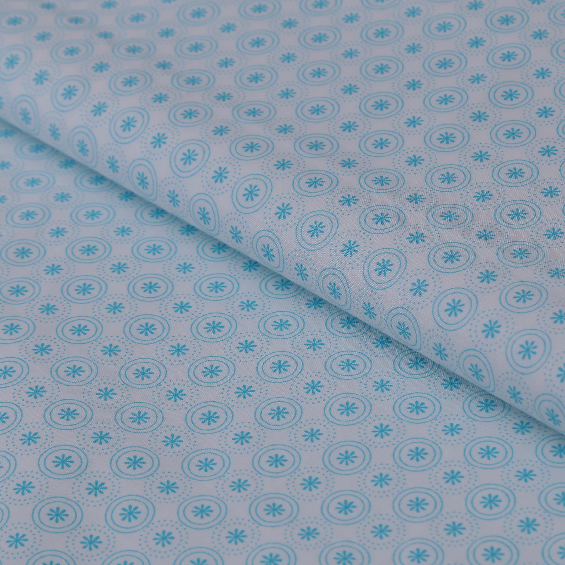 Stoffa Tante Ema bianca con cerchi e fiori azzurri TANTE EMA 130X30CM