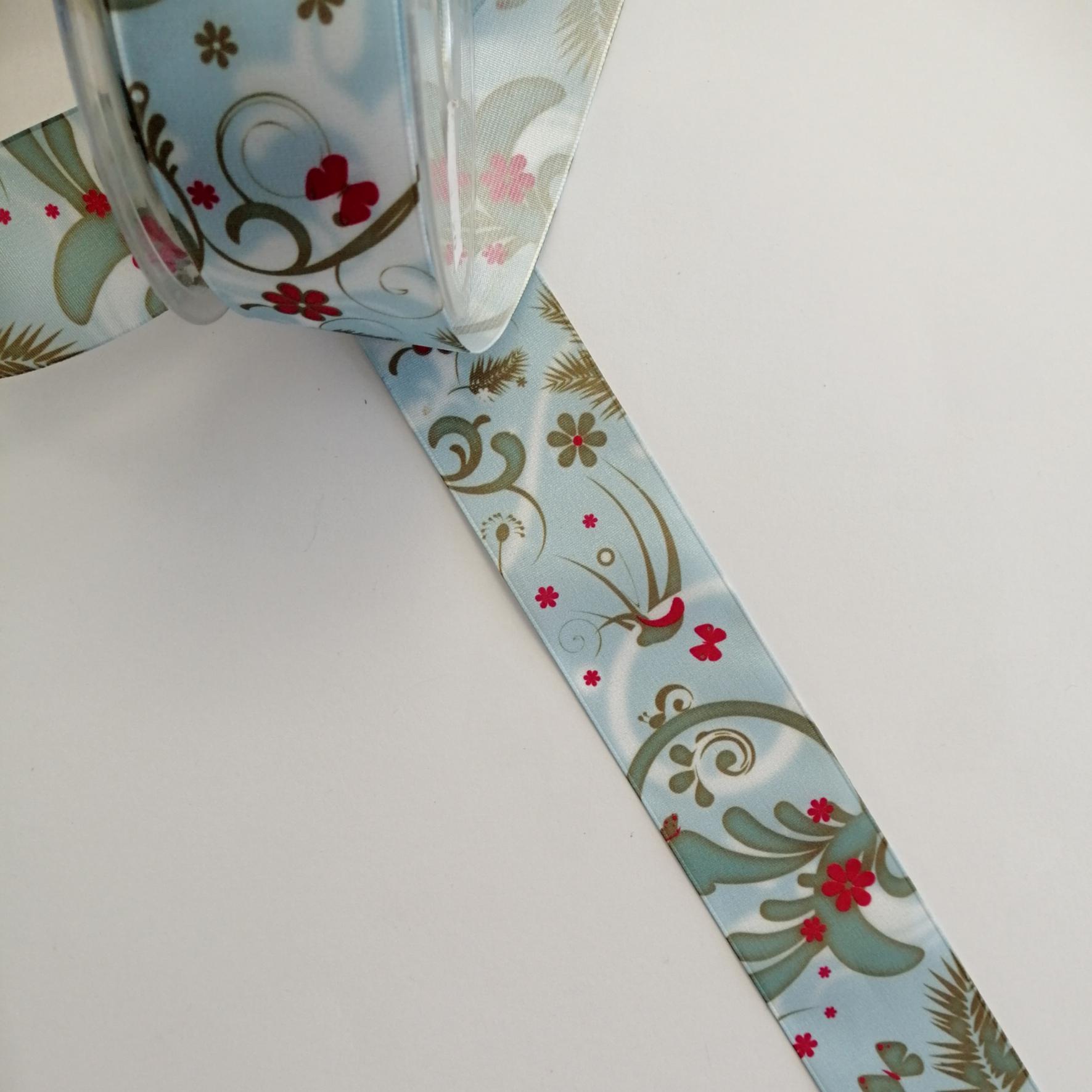 nastro al metro celeste  con fiori e ghirigori Stafil 40 mm per 1 mt