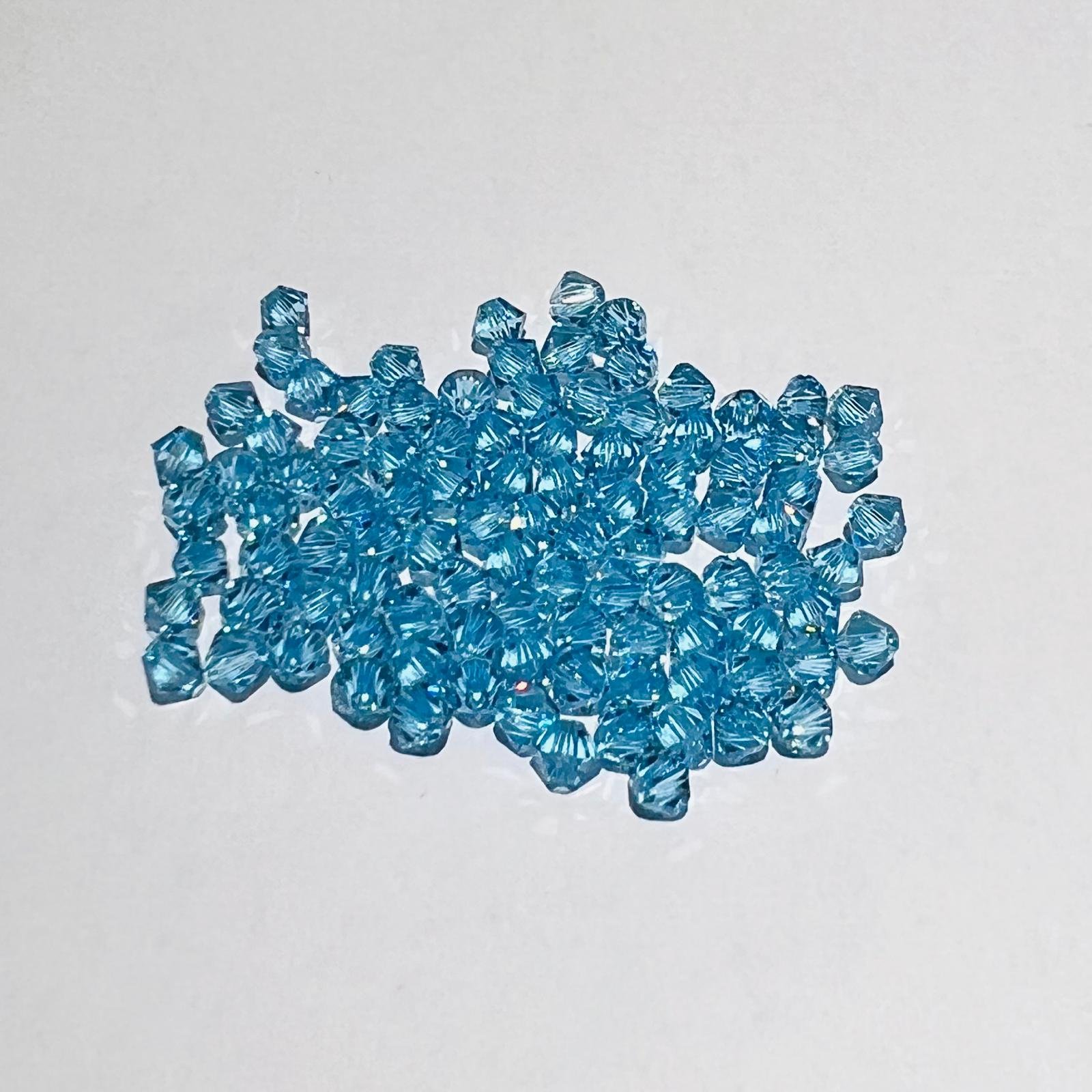 Swarovski bicono Aquamarine 4 mm swarovski 4 mm (busta da 100 pz)