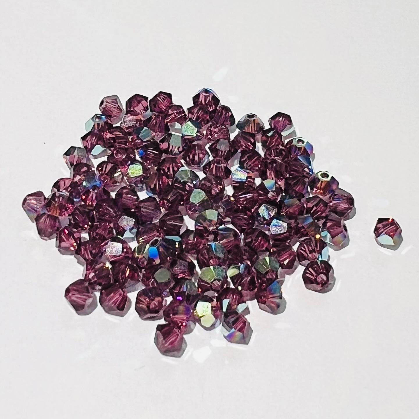Swarovski bicono Amethyst Ab 3 mm swarovski 3 mm (busta da 100 pz)