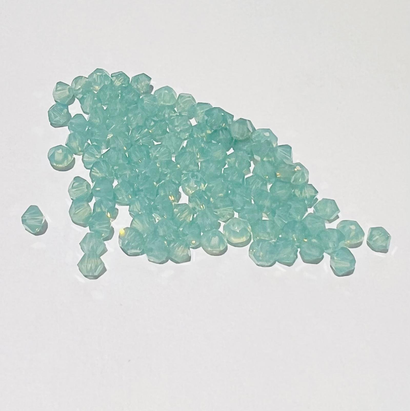 Swarovski bicono Pacific Opal 3 mm swarovski busta da 100 pz