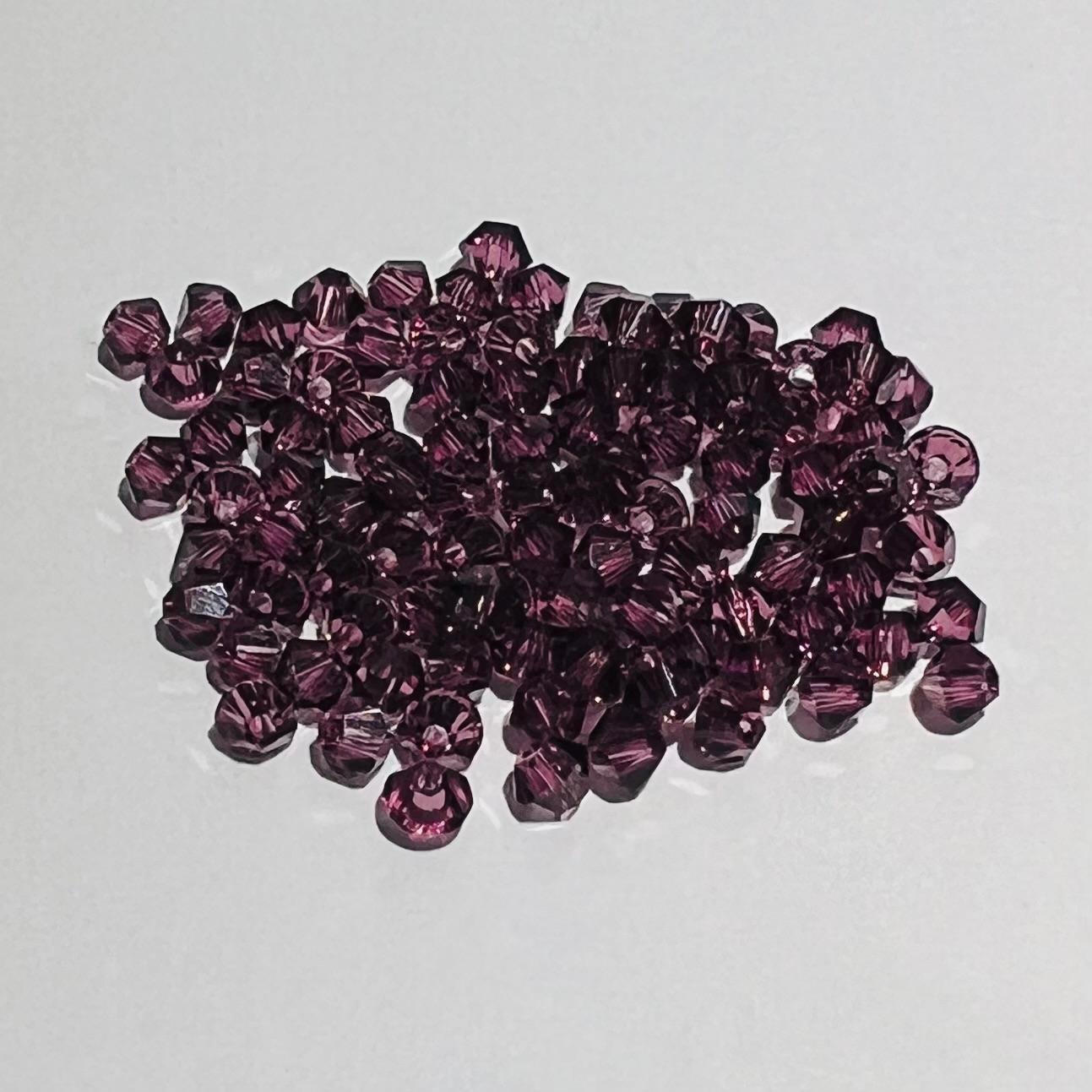 Swarovski bicono Amethyst 3 mm swarovski busta da 100pz