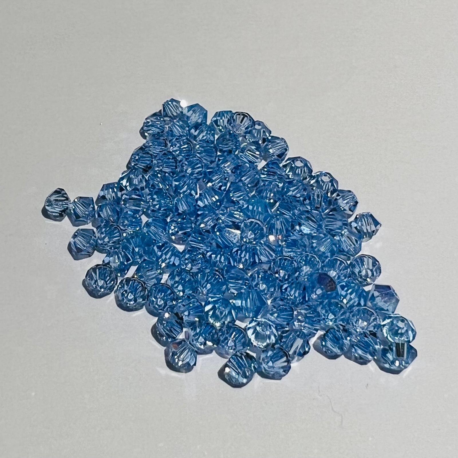 Swarovski bicono Light Sapphire 3 mm swarovski busta da 100 pz