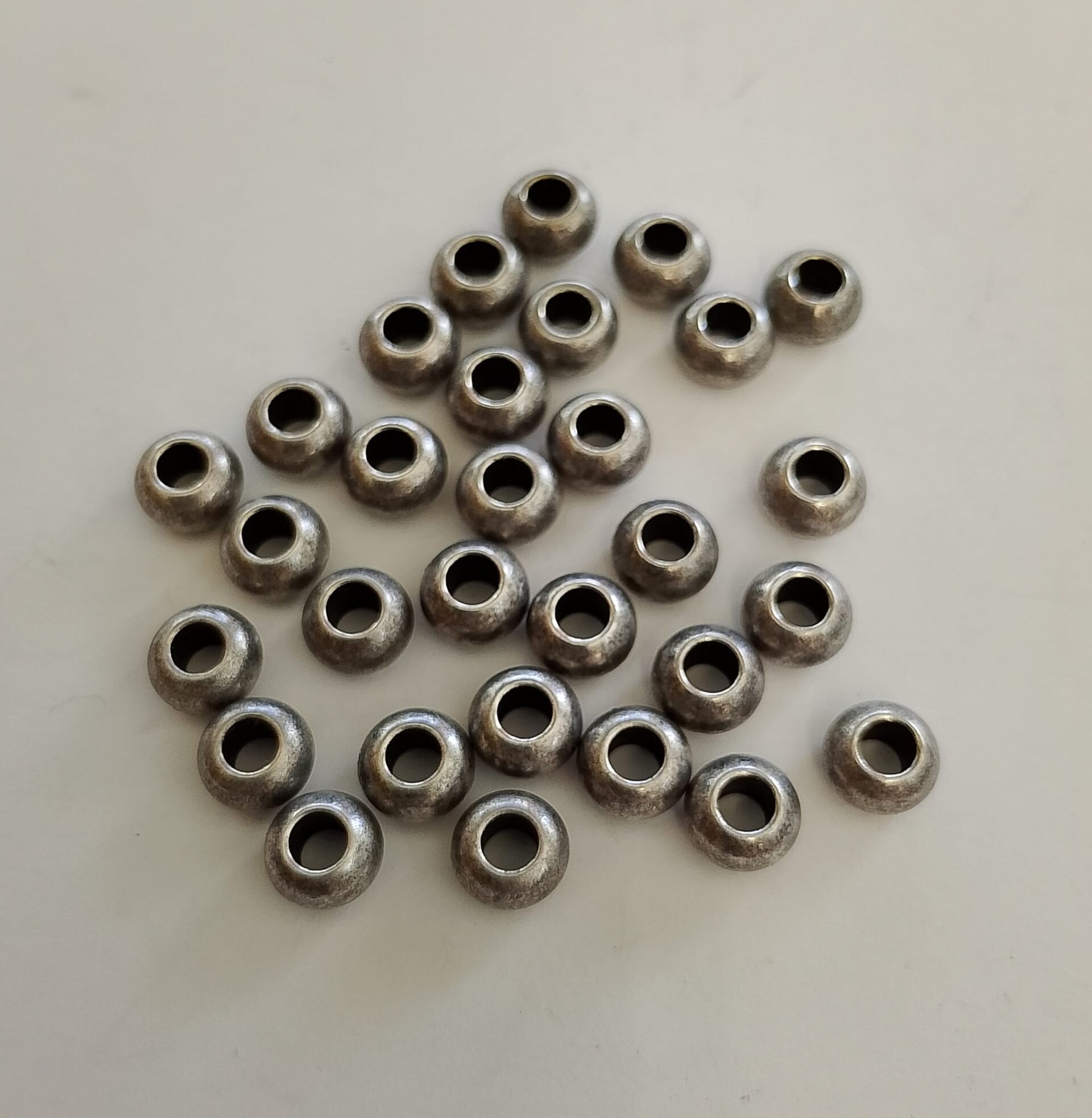 rondelle argento antico a foro largo per cordini 4mm menoni busta da 30 pezzi