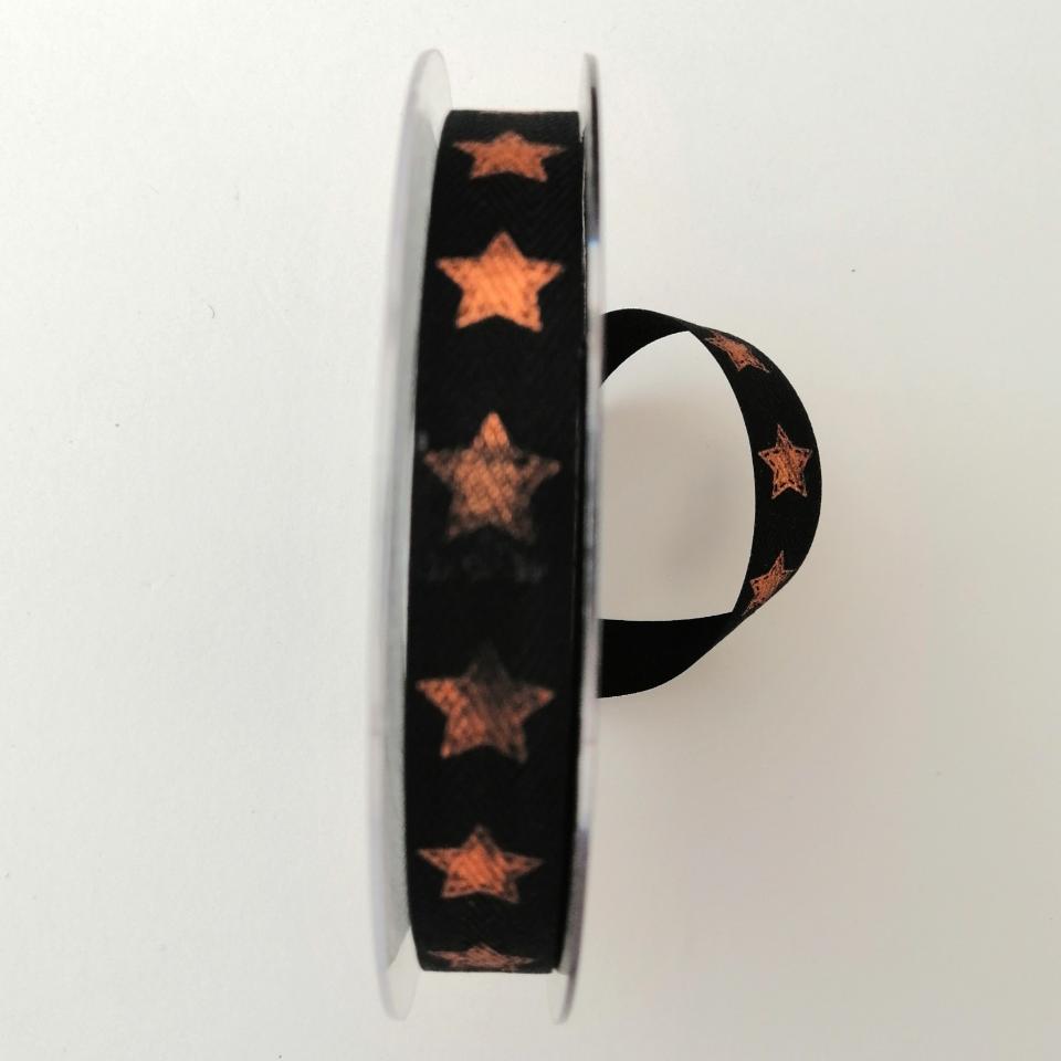 decoro stelle colore rame pbs fondo nero mm15 tessuto a lisca di pesce