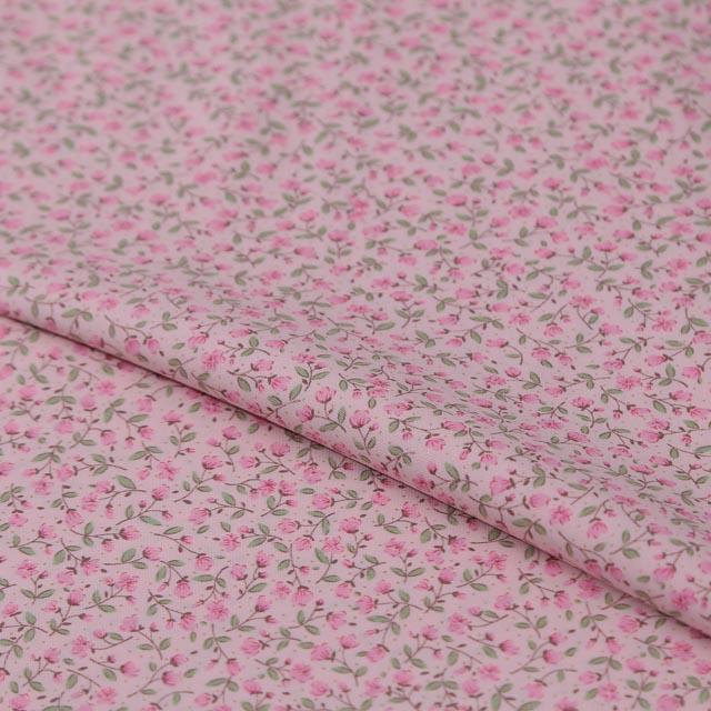 Stoffa in cotone rosa con fiori rosa  e foglioline verdi stafil altezza 110 cm x  50cm