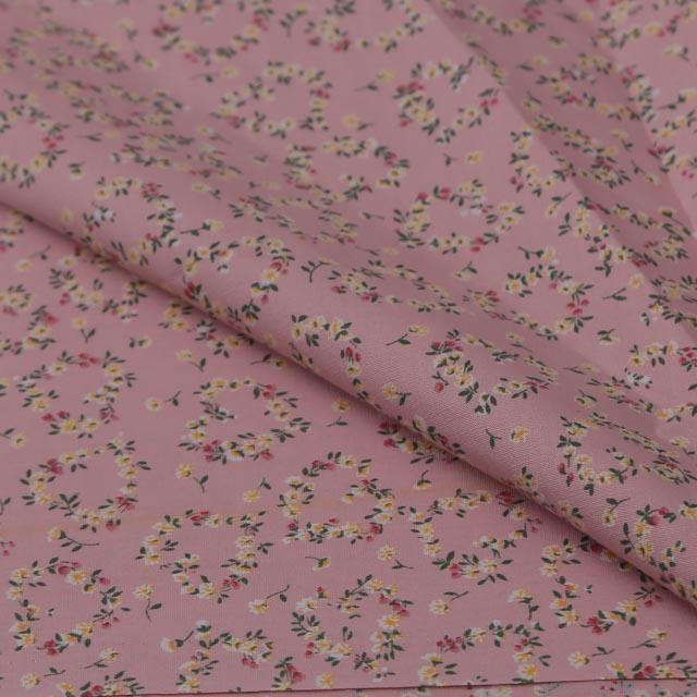 Stoffa in cotone rosa  con coroncine con fiorellini gialli stafil altezza 110 cm x  50cm