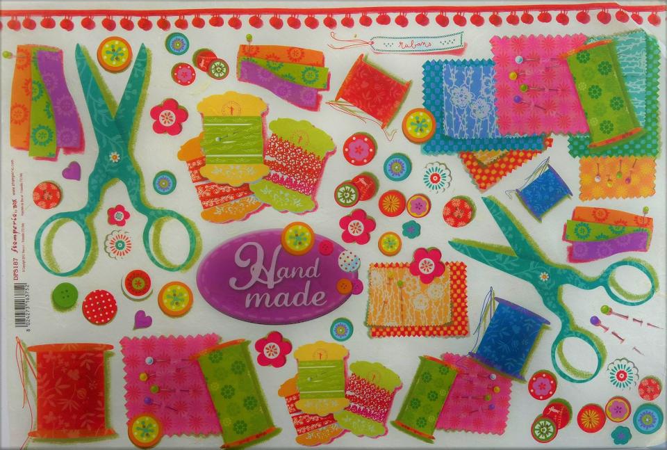 Carta riso cucito hand made con bottoni forbici e filo stamperia 33x48