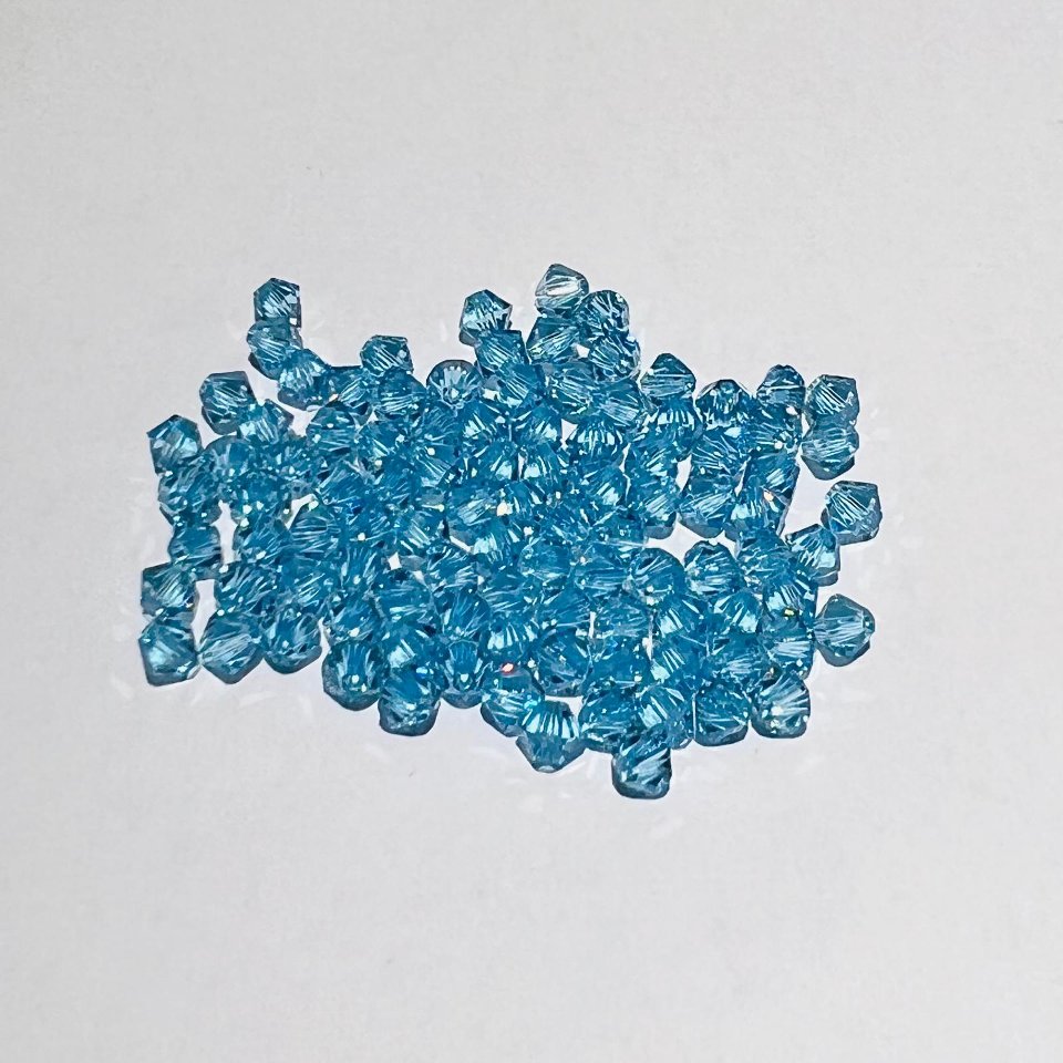 Swarovski bicono Aquamarine 4 mm swarovski 4 mm (busta da 100 pz)