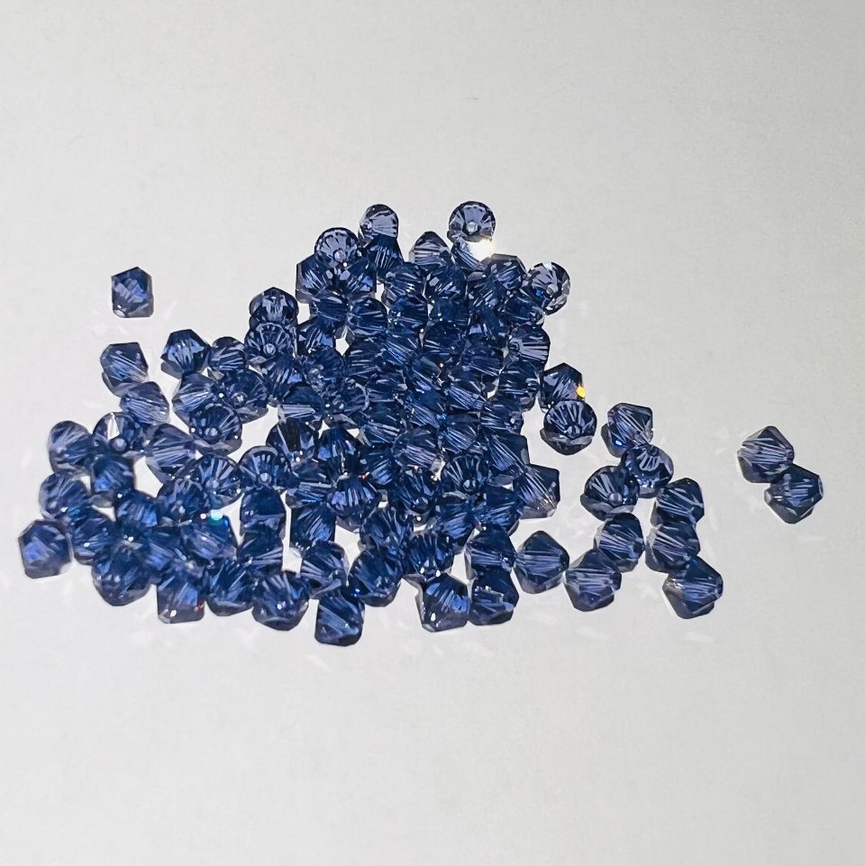 Swarovski bicono Tanzanite 4 mm swarovski 4 mm (busta da 100 pz)