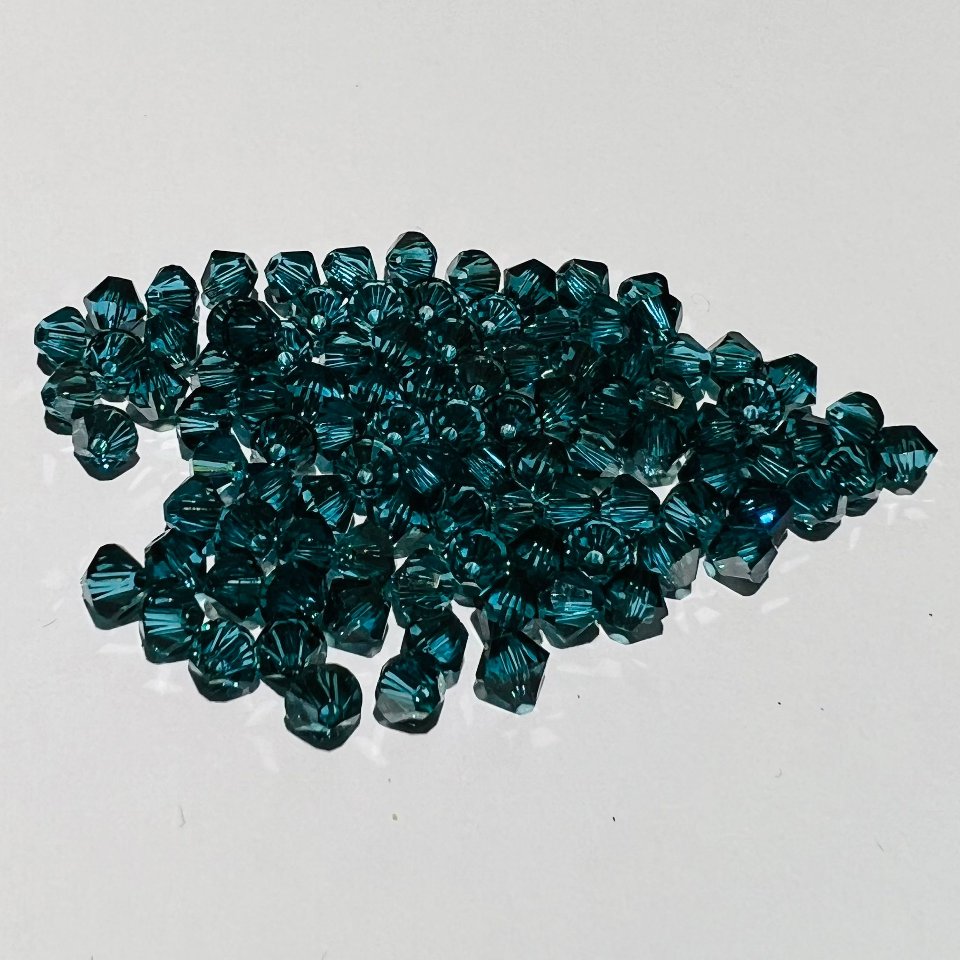 Swarovski bicono Indicolite Satin 4 mm swarovski 4 mm (busta da 100 pz)