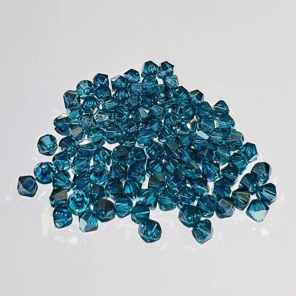 Swarovski bicono Indicolite Ab 4 mm swarovski 4 mm (busta da 100 pz)