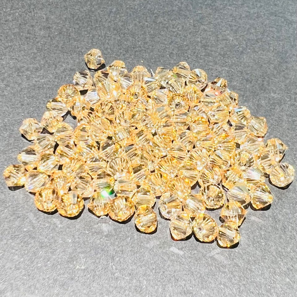 Swarovski bicono Crystal Golden Shadow 4 mm swarovski 4 mm (busta da 100 pz)