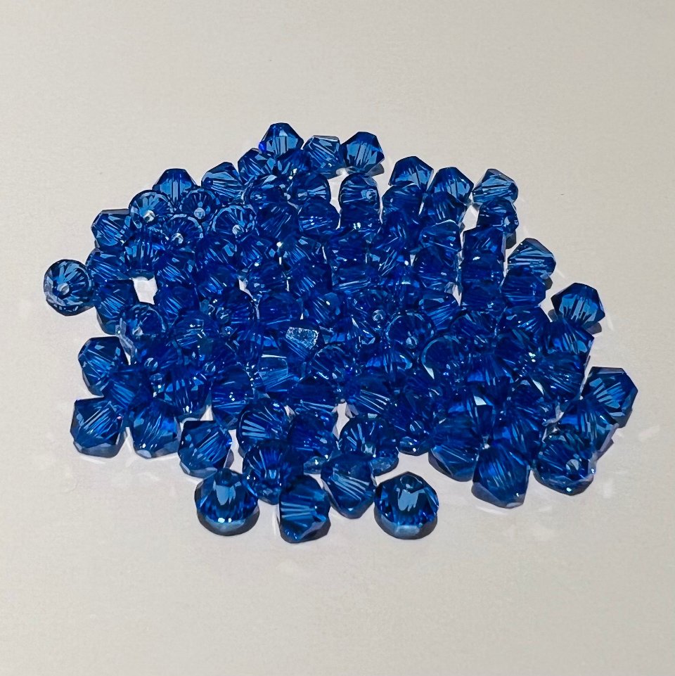 Swarovski bicono Sapphire 4 mm swarovski 4 mm (busta da 100 pz)