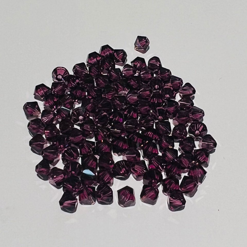 Swarovski bicono Amethyst 4 mm swarovski 4 mm (busta da 100 pz)