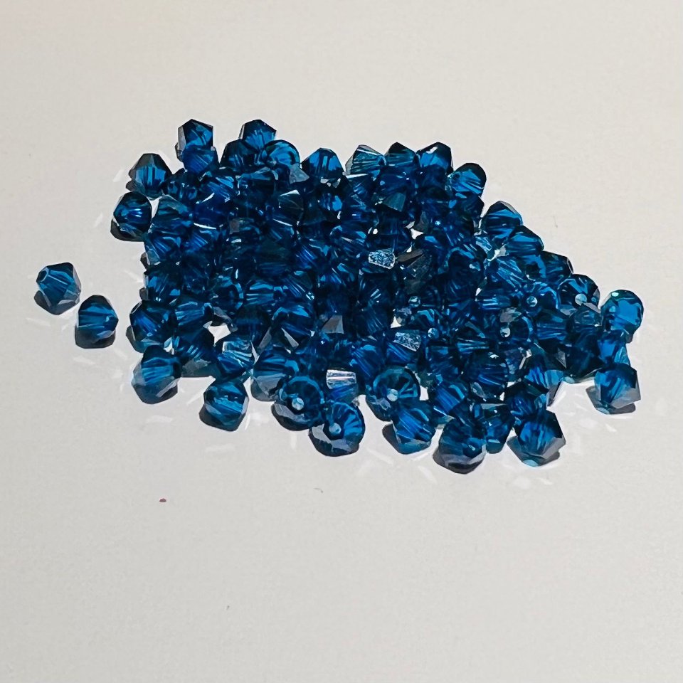 Swarovski bicono Capri Blue 4 mm swarovski 4 mm (busta da 100 pz)