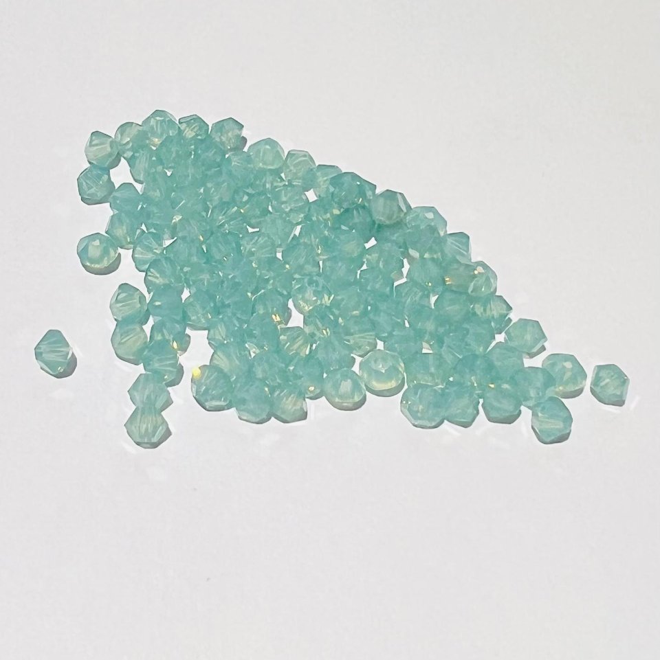 Swarovski bicono Pacific Opal 3 mm swarovski busta da 100 pz