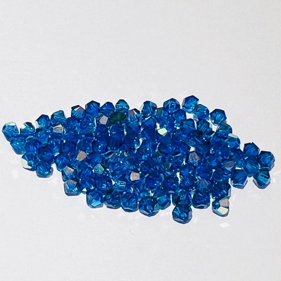 Swarovski bicono Capri Blue Ab 3 mm swarovski 3 mm (busta da 100 pz)