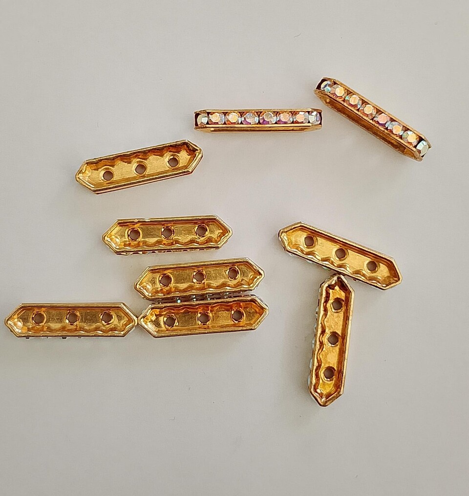 divisori a tre fori di swarovski dorati con strass laterale mm 15,5 mm swarovski busta da 10 pezzi