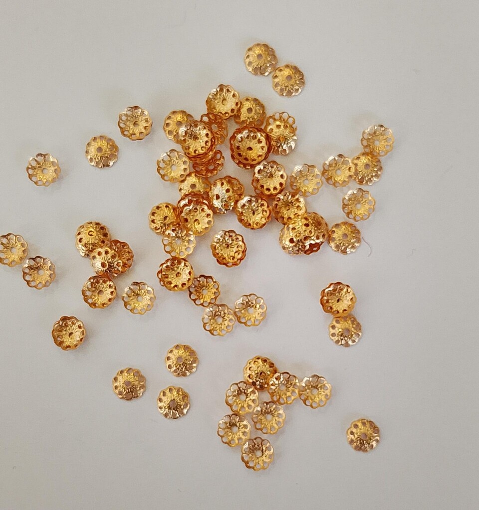 coppetta copriperla oro menoni busta da 100 pezzi