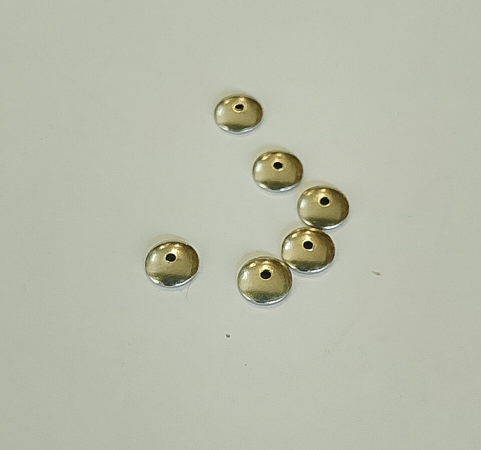 coppetta copriperla titanio diametro 5 mm menoni busta da 100 pezzi