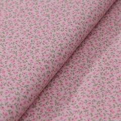 Stoffa in cotone rosa con fiori rosa  e foglioline verdi stafil altezza 110 cm x  50cm
