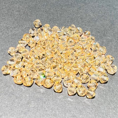 Swarovski bicono Crystal Golden Shadow 4 mm swarovski 4 mm (busta da 100 pz)