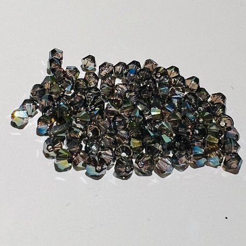 Swarovski bicono Crystal Iridescent Green 4 mm swarovski 4 mm (busta da 100 pz)