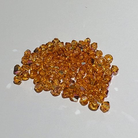 Swarovski bicono Topaz Ab 3 mm swarovski 3 mm (busta da 100 pz)