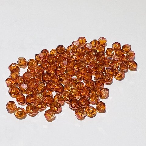 Swarovski bicono Crystal Copper 3 mm swarovski 3 mm (busta da 100 pz)