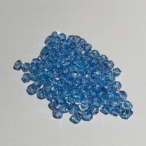 Swarovski bicono Light Sapphire 3 mm swarovski 3 mm (busta da 100 pz)