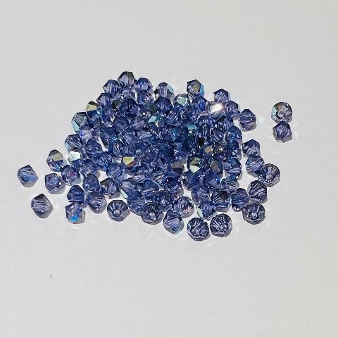 Swarovski bicono Tanzanite Ab 3 mm swarovski 3 mm (busta da 100 pz)