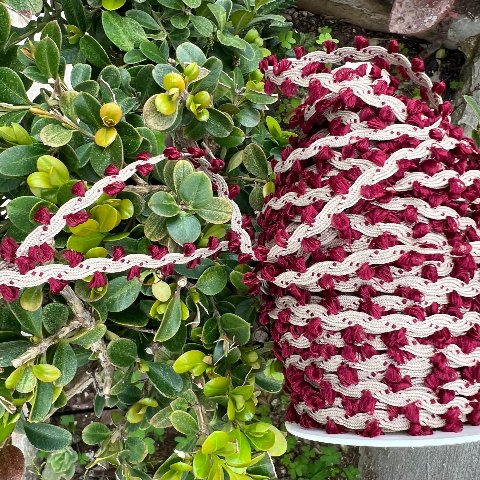 Passamaneria color corda in cotone con piccole nappinebordeaux Stafil 10mm x 1 mt