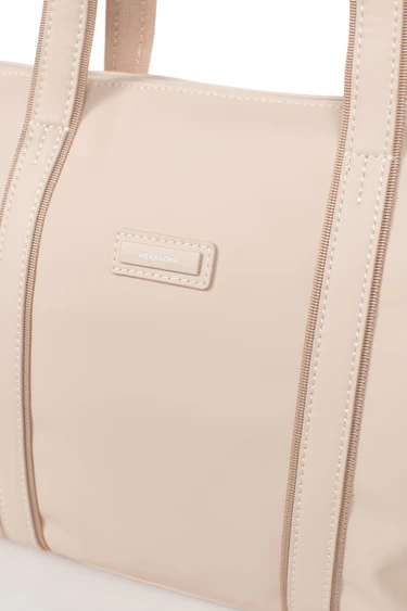 BORSA A MANO CON TRACOLLA HEXAGONA LINEA TARA