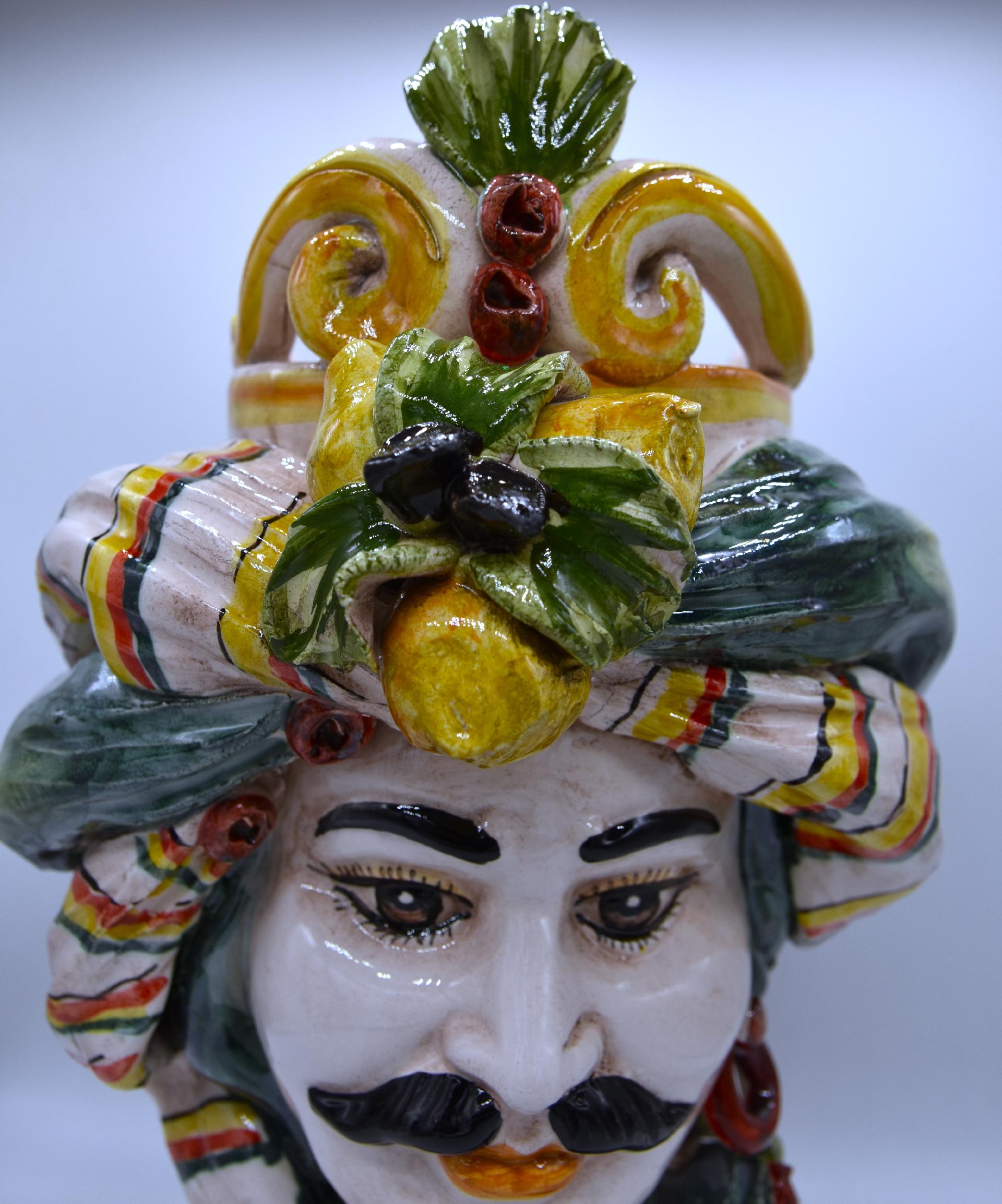 Coppia Teste di moro con limoni e turbante decoro verde Produzione artigianale di Caltagirone h.30cm