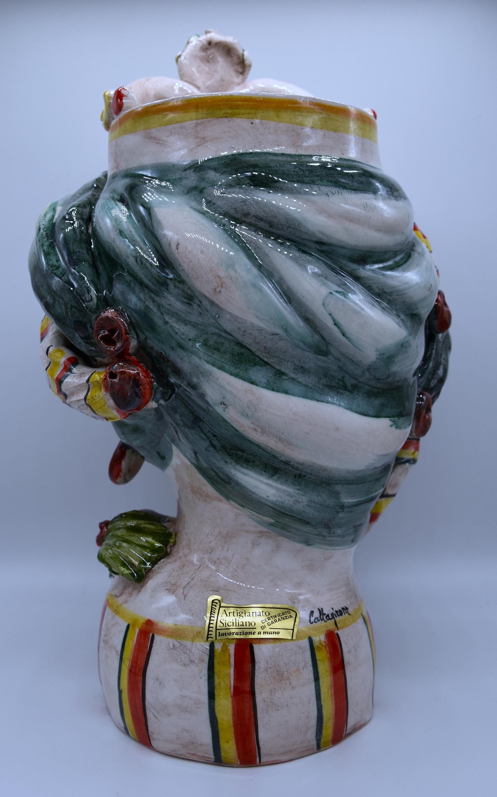 Coppia Teste di moro con limoni e turbante decoro verde Produzione artigianale di Caltagirone h.30cm