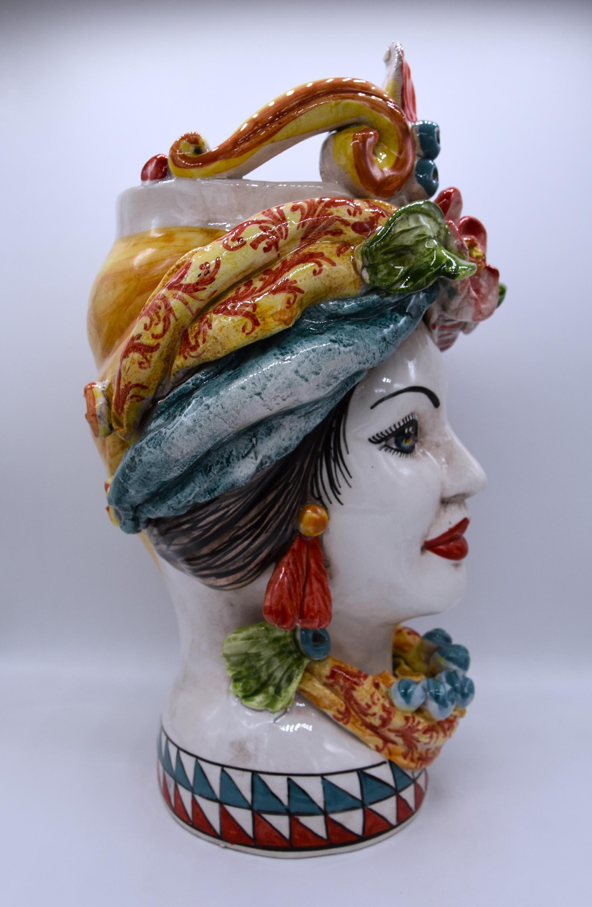 Coppia teste di moro con corona e turbante decoro carretto siciliano Produzione artigianale di Caltagirone h.30cm