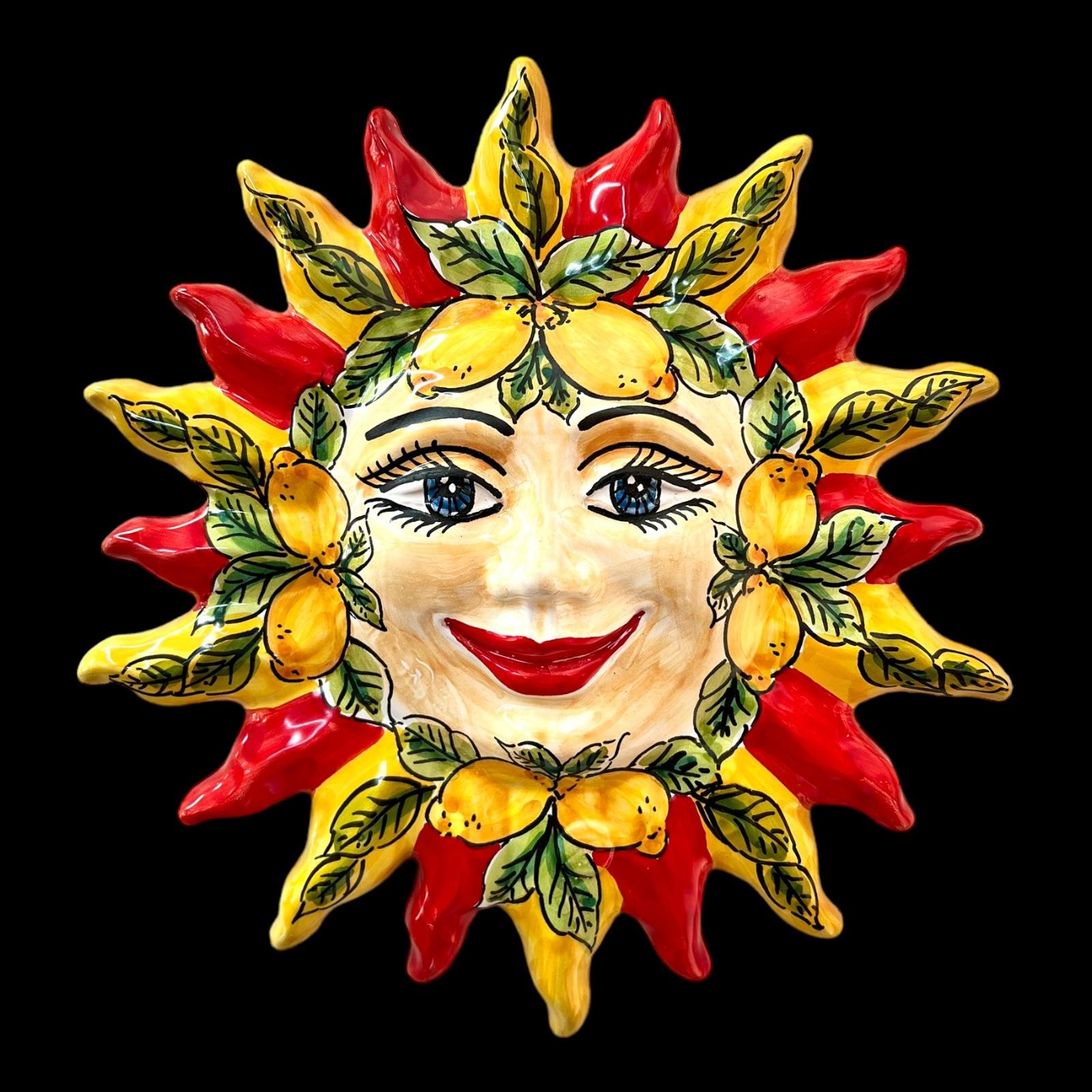 Sole da parete in ceramica siciliana decoro giallo e rosso con limoni Produzione artigianale di Santo Stefano di Camastra Lunghezza 25cm
