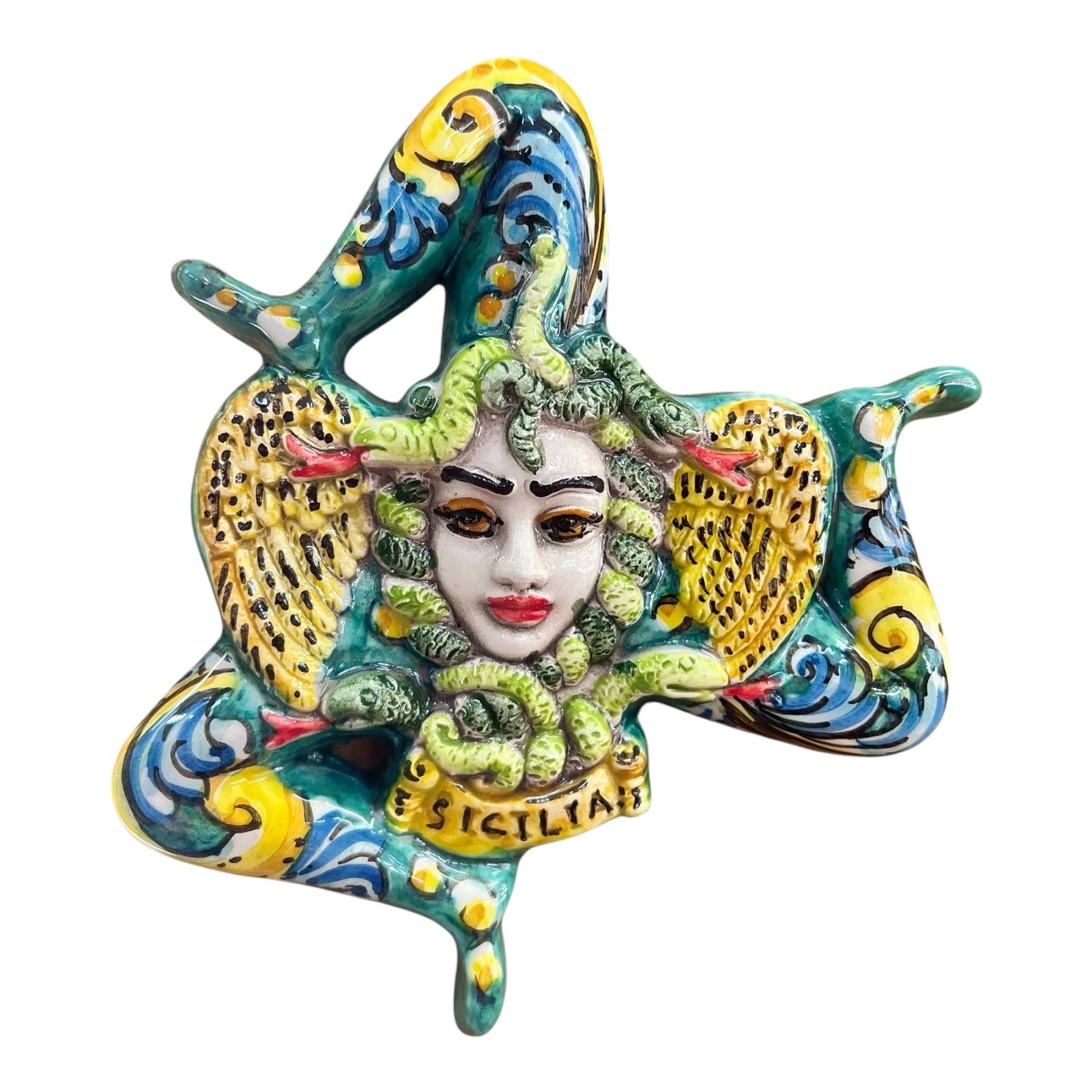 Trinacria ornamentale da parete in ceramica siciliana decoro ornato fondo verde Produzione artigianale di Caltagirone Lunghezza 17cm