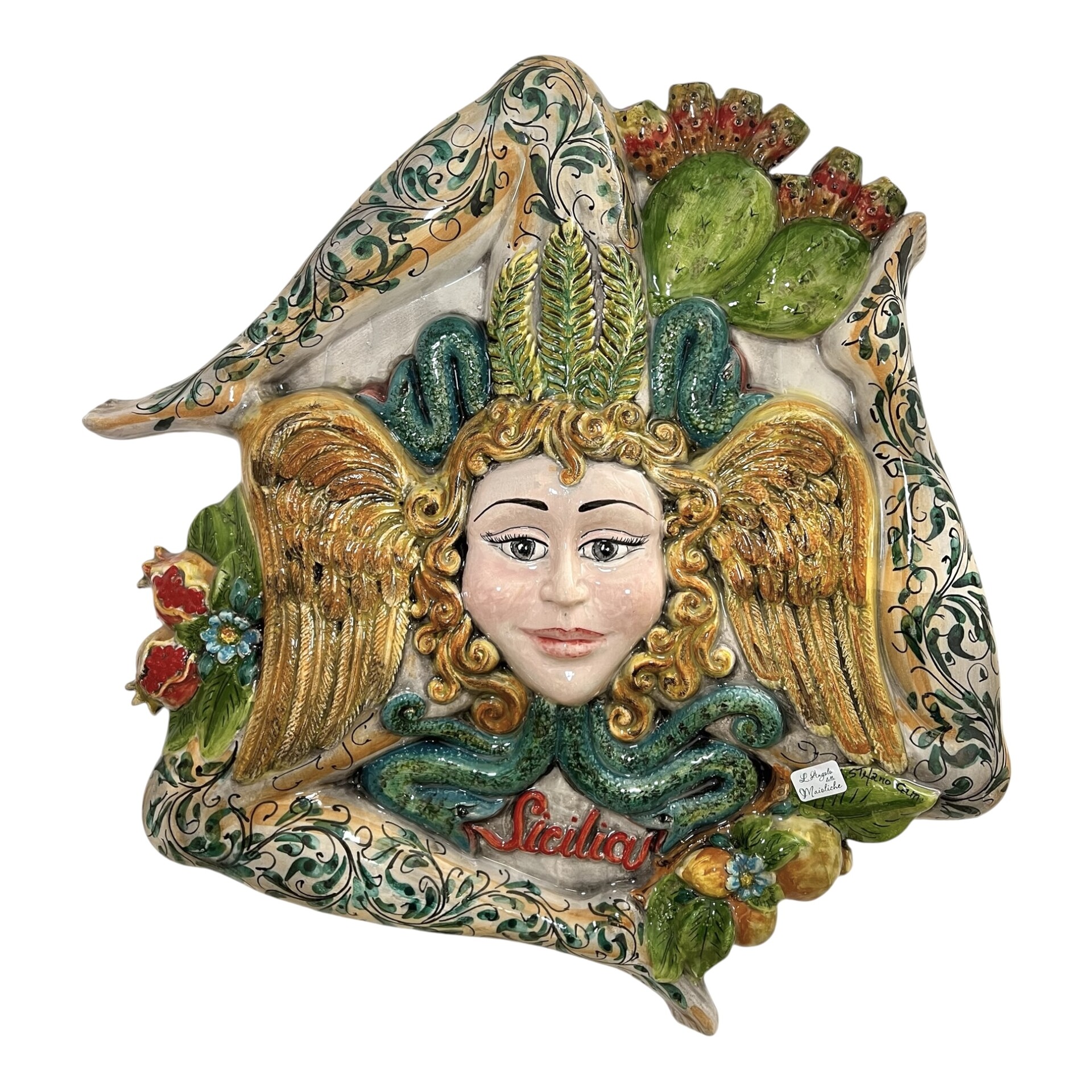 Trinacria ornamentale da parete gigante decorata con frutta in rilievo in ceramica siciliana Produzione artigianale di Santo Stefano di Camastra Lunghezza 55cm