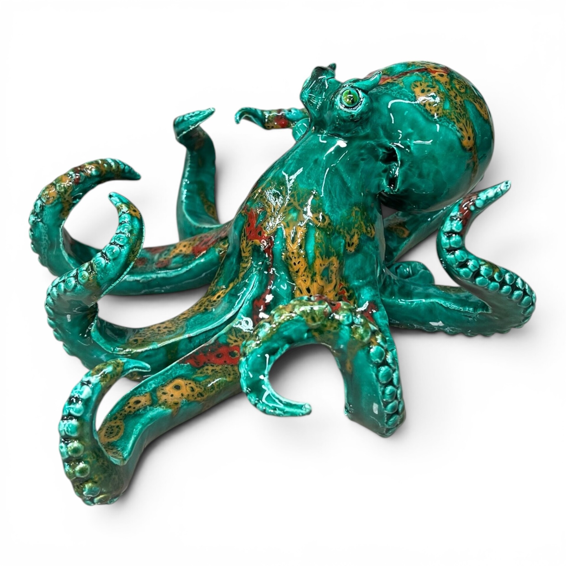 Scultura Polpo grande decoro verde ramina con sfumature rosse e gialle in ceramica siciliana Produzione artigianale di Palermo lunghezza 30cm