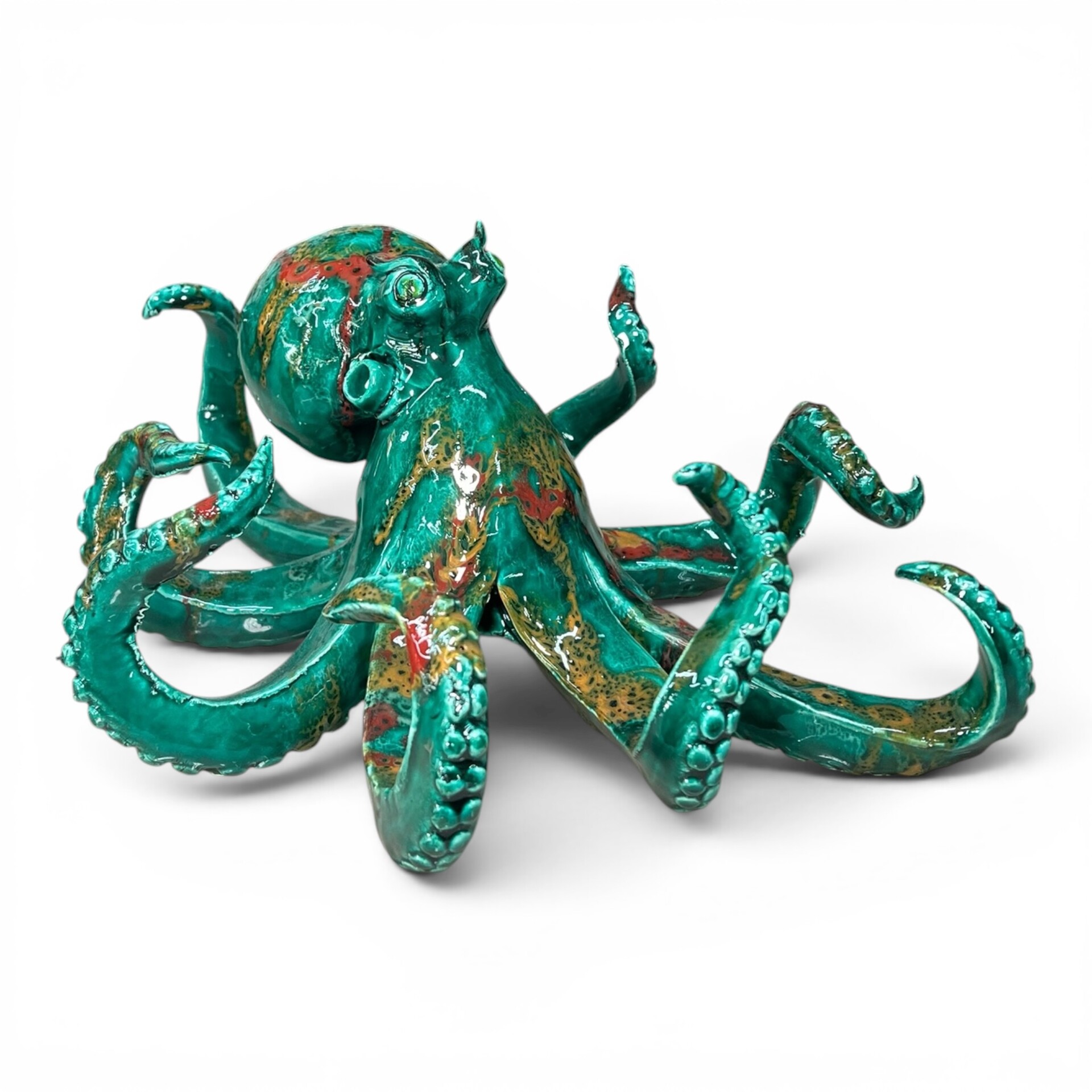 Scultura Polpo grande decoro verde ramina con sfumature rosse e gialle in ceramica siciliana Produzione artigianale di Palermo lunghezza 30cm
