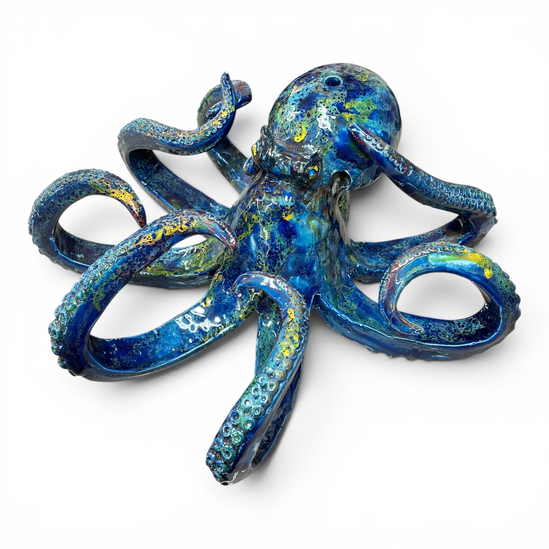 Scultura Polpo gigante decoro blu marino sfumature rosse e gialle in ceramica siciliana Produzione artigianale di Palermo lunghezza 40cm